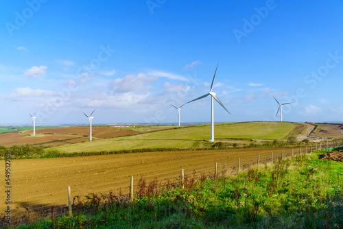 Wind turbines farm and countryside, in Cornwell