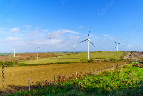 Wind turbines farm and countryside, in Cornwell photo