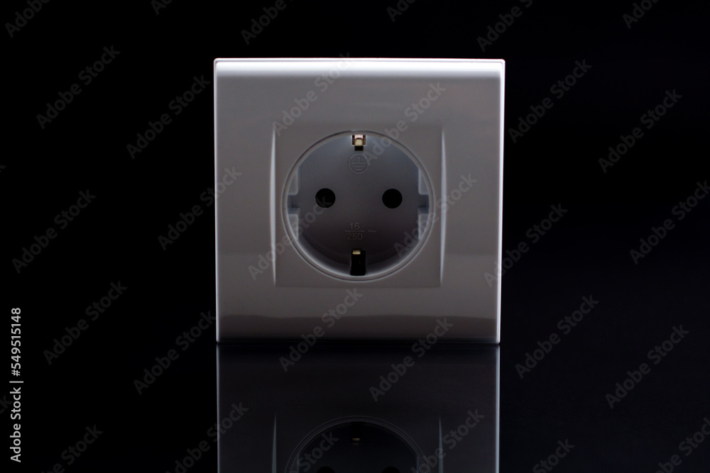 European white wall outlet, black background European white wall outlet, black background