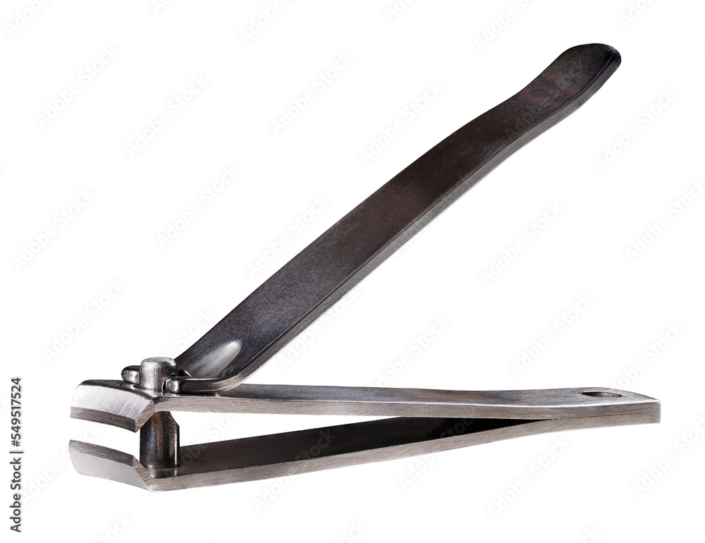 Metal nail clippers on an isolated background. Metal nail clippers on an isolated background.