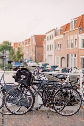 A typical picture from a small Dutch town: Several bicycles are leaning against a bridge over a small river. © Miriam