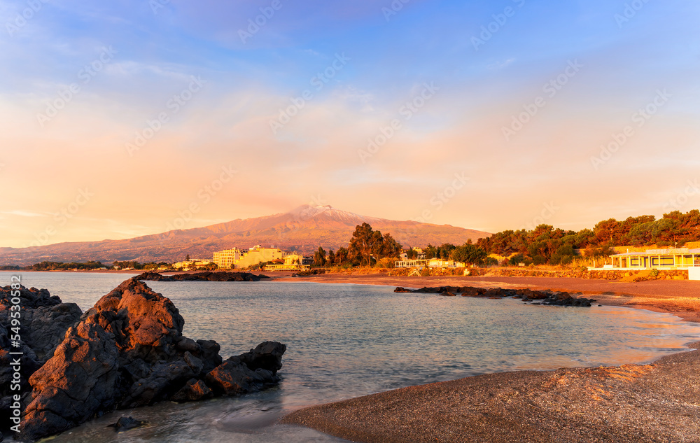 morning or evening landscape with nice beach during sunrise or sunset in sea with amazing isle with rocks and beautiful clouds on background
