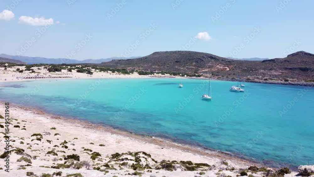 Aerial View of Crystal-Clear Turquoise Water, Transparent Sea, and Little Boats in Greek island Aerial View of Crystal-Clear Turquoise Water, Transparent Sea, and Little Boats in Greek island