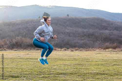  young woman in sportswear exercise and run outside