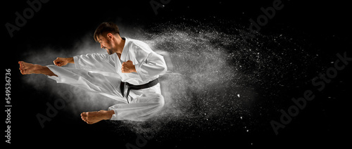 Martial arts masters. Black background