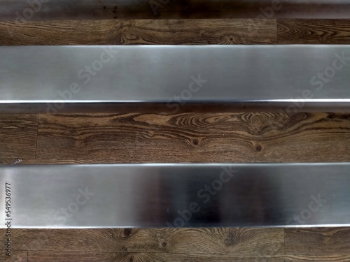 stainless steel plate on wood
