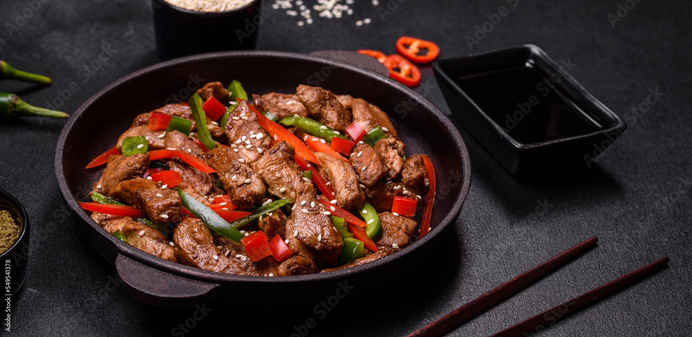Delicious Asian teriyaki meat with red and green bell peppers