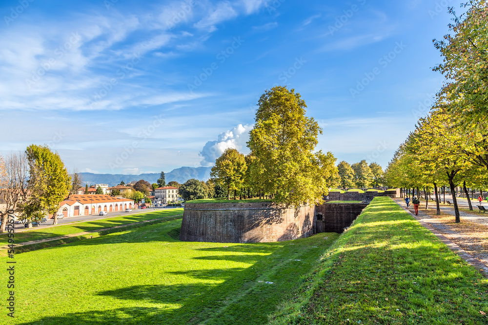 Fototapeta premium Lucca, Italy. Picturesque promenade on the medieval fortress wall