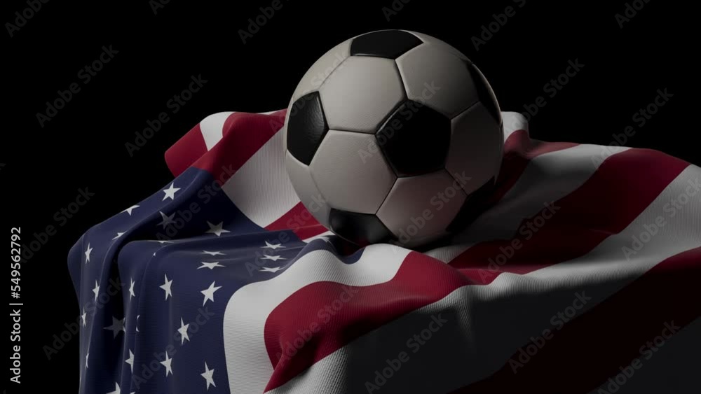 A loop able animation of  light revolving from light to dark around a regular soccer ball resting on a USA flag draped over a plinth