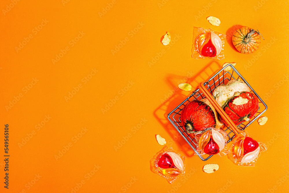 Fototapeta premium Sale concept for machine washing. Capsules with detergent and autumn decor in traditional basket