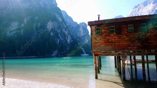 Wooden house in the Braise lake, dolomites