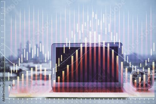 Forex Chart hologram on table with computer background. Multi exposure. Concept of financial markets. © peshkova