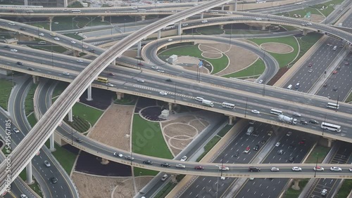 Aerial view of big highway intersection at Sheikh Zayed road in Dubai in a summer day, United Arab Emirates
 photo