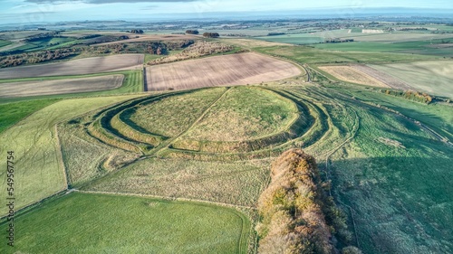 Aerial shot of an iron age hill fort Barbury castle in Wiltshire, England photo