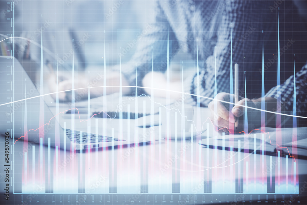 Multi exposure of forex chart with man working on computer on background. Concept of market analysis.