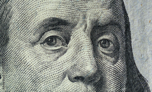 Closeup of Benjamin Franklin on 100 dollar bill © Jason Busa