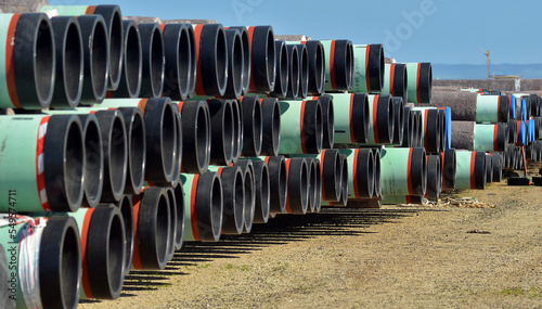 HUge pipes stacked in a refinery storage yard before transportaion to pipeline build in the southern Highlands PNG photo