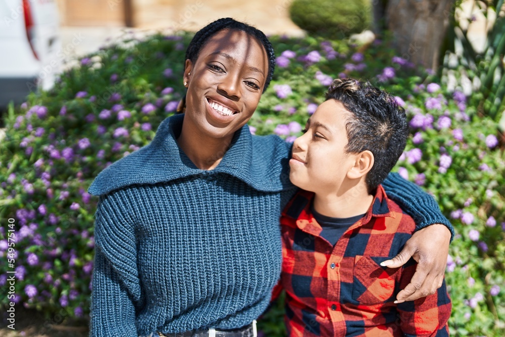 African american mother and son smiling confident hugging each other at park African american mother and son smiling confident hugging each other at park