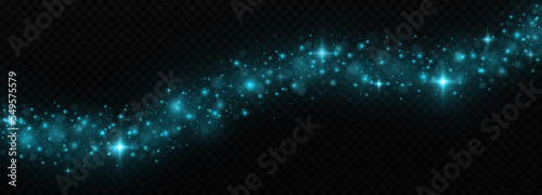 Blue luminous dust with colorful lights bokeh. Christmas trail concept. Abstract glowing lights isolated on transparent background. Magic concept.