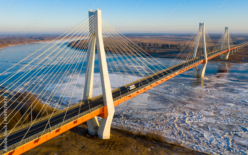Obraz premium Flight over cable-stayed bridge over the Oka River. Russia