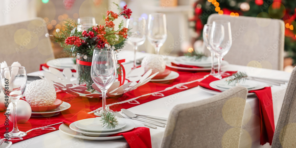 Stylish table setting for Christmas dinner at home Stylish table setting for Christmas dinner at home
