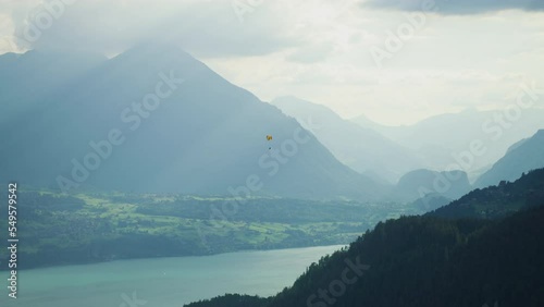 Paragliding over Lake Thun, Switzerland photo