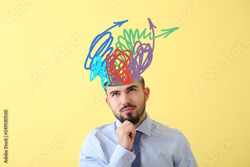 Thoughtful young businessma...