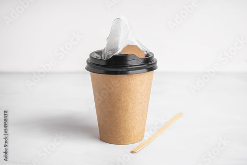 Paper cup, stick and tea ba...