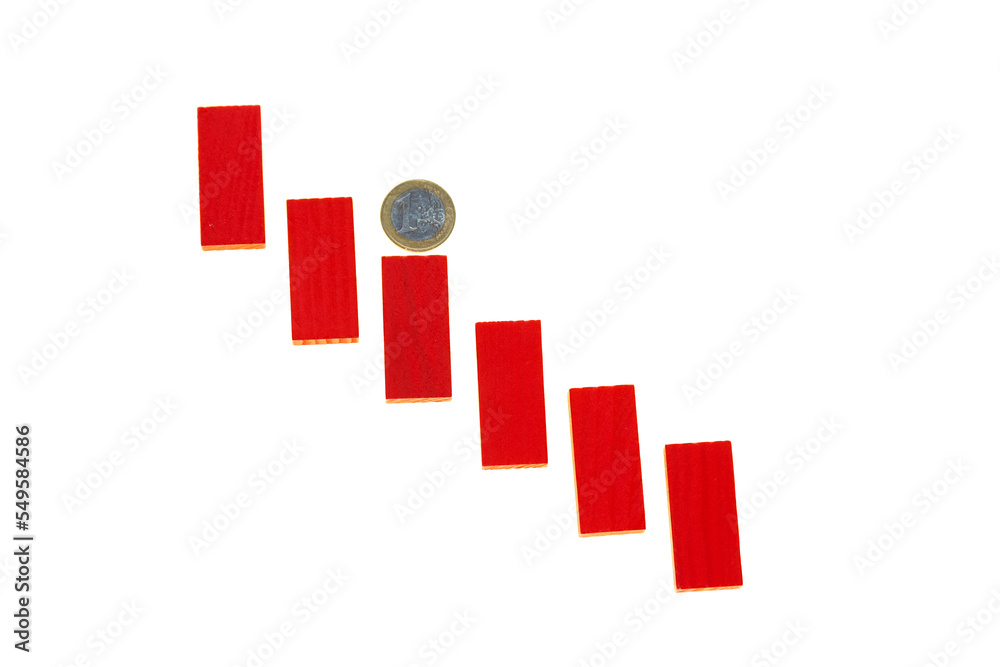 Euro inflation. One euro coin on a red step ladder isolated on a white background.Falling euro currency rate. Euro inflation. One euro coin on a red step ladder isolated on a white background.Falling euro currency rate.