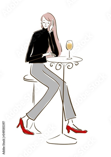 Woman enjoying a drink in a café.