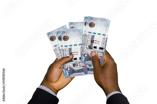 Black Hands in suit holding 3D rendered Saudi Riyal notes