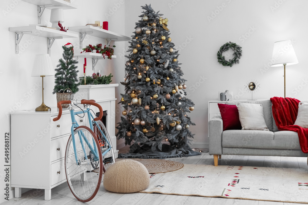 Fototapeta premium Interior of living room with Christmas trees and bicycle