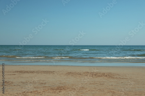 Beautiful view of sea shore and blue sky on summer day