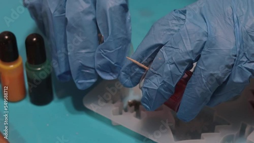person using epoxy resin