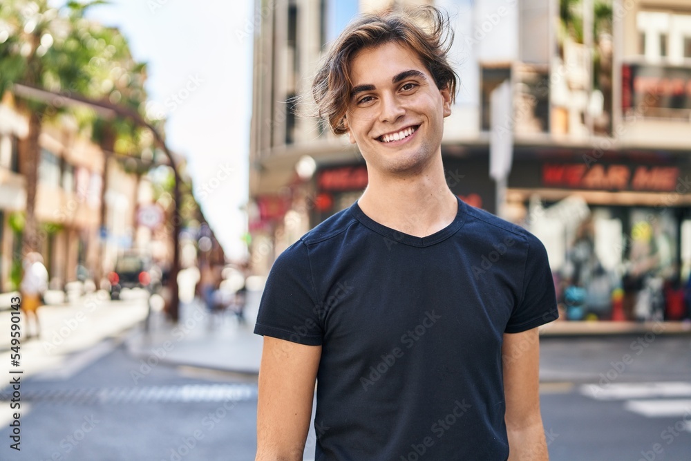 Young caucasian man smiling confident standing at street Young caucasian man smiling confident standing at street