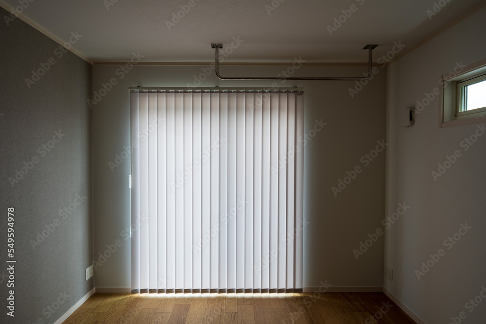 Fototapeta premium New house image - Living room with vertical blinds