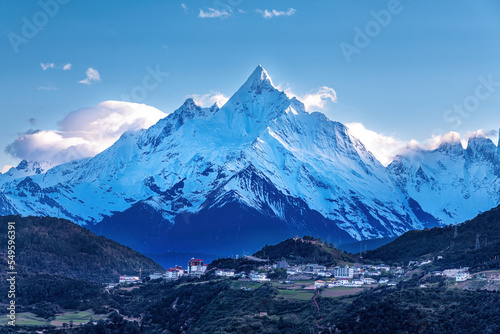 Meri snow mountain and town landscape in Deqen prefecture Yunnan province, China.	
 photo