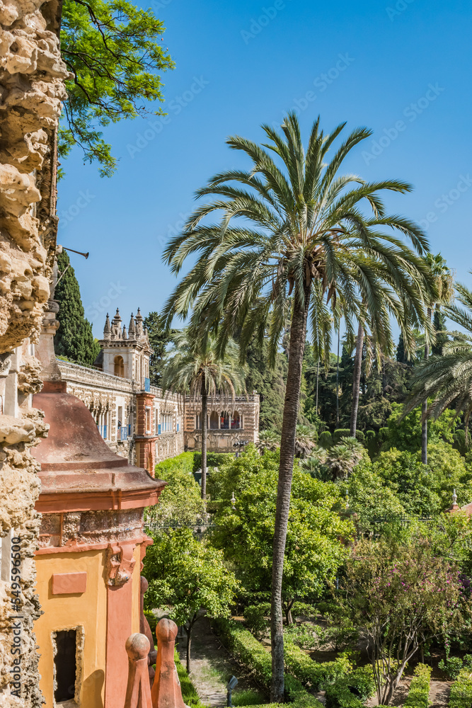 Wall and Gallery of Grutesques in perspective and Garden next garden with palm trees of the Real Alcazár of Seville SPAIN 