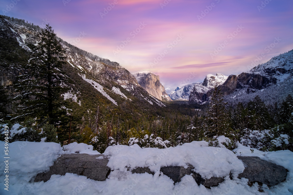 The tunnel View vista point at Yosemite National Park with snow in California's Yosemite National Park, California, USA The tunnel View vista point at Yosemite National Park with snow in California's Yosemite National Park, California, USA