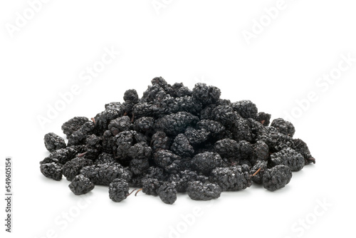 Dried black mulberries on white background
