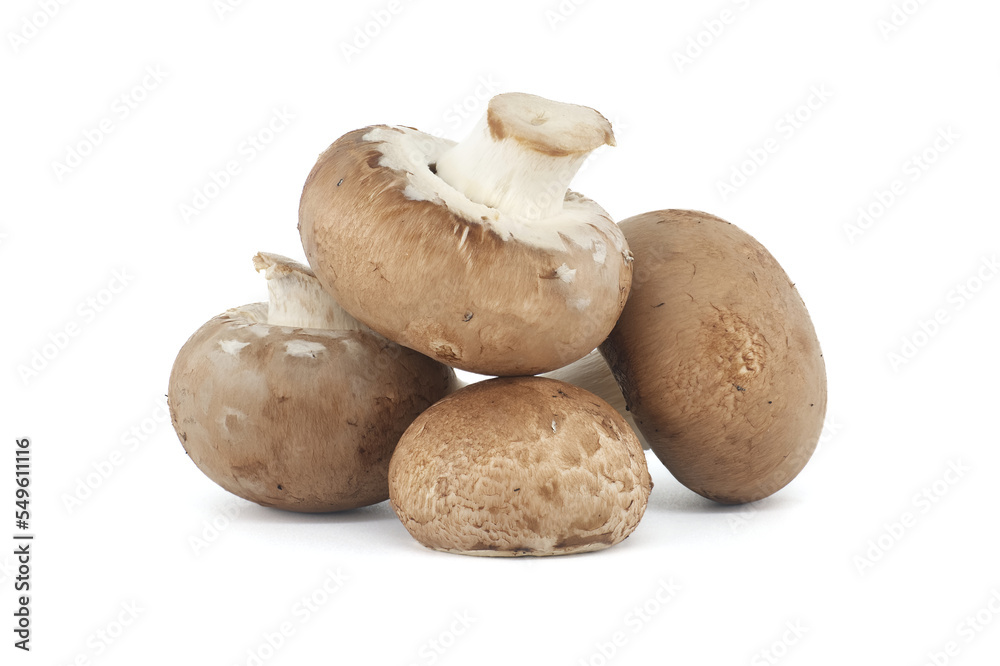 Baby Bella whole mushrooms over white background Baby Bella whole mushrooms over white background