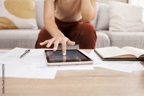 Woman, budget with paper and tablet in home to review financial or online investment contract. Internet planning, advisory consultant or research on startup investor portfolio or sale report in house