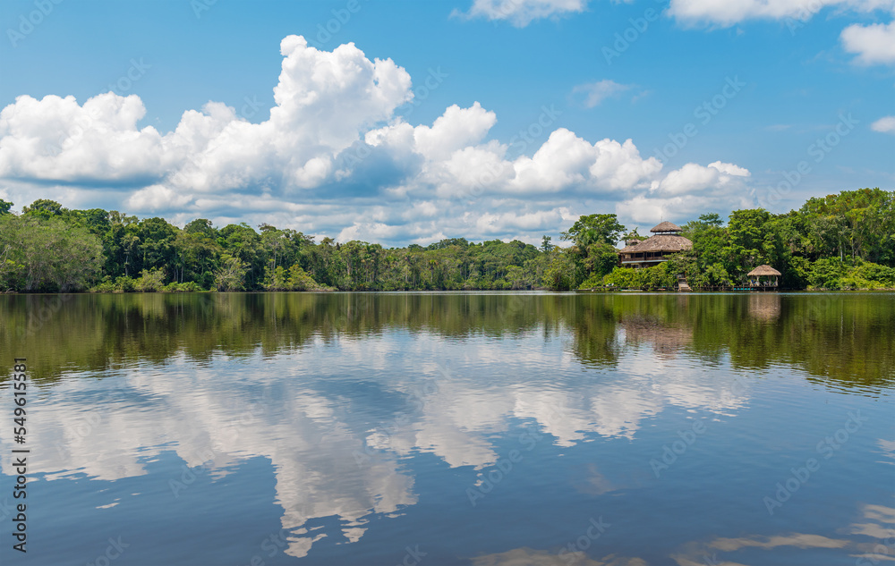 Fototapeta premium Amazon rainforest lodge reflection, Yasuni national park, Ecuador.