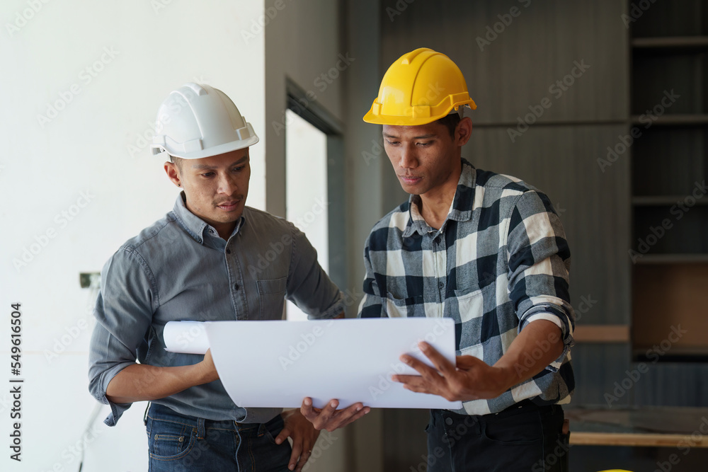 Professional architect designer structural engineer team colleagues discussing building plan design project Professional architect designer structural engineer team colleagues discussing building plan design project