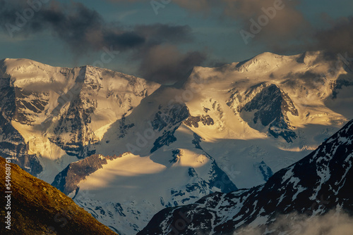 View of Morteratsch and snowcapped mountains, Bernina massif in Switzerland photo