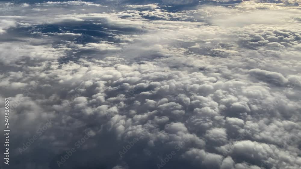 White clouds on blue sky background, beautiful aerial cloudscape view from above, sunny heaven landscape, bright cloudy sky view from airplane window , White clouds on blue sky background, beautiful aerial cloudscape view from above, sunny heaven landscape, bright cloudy sky view from airplane window ,