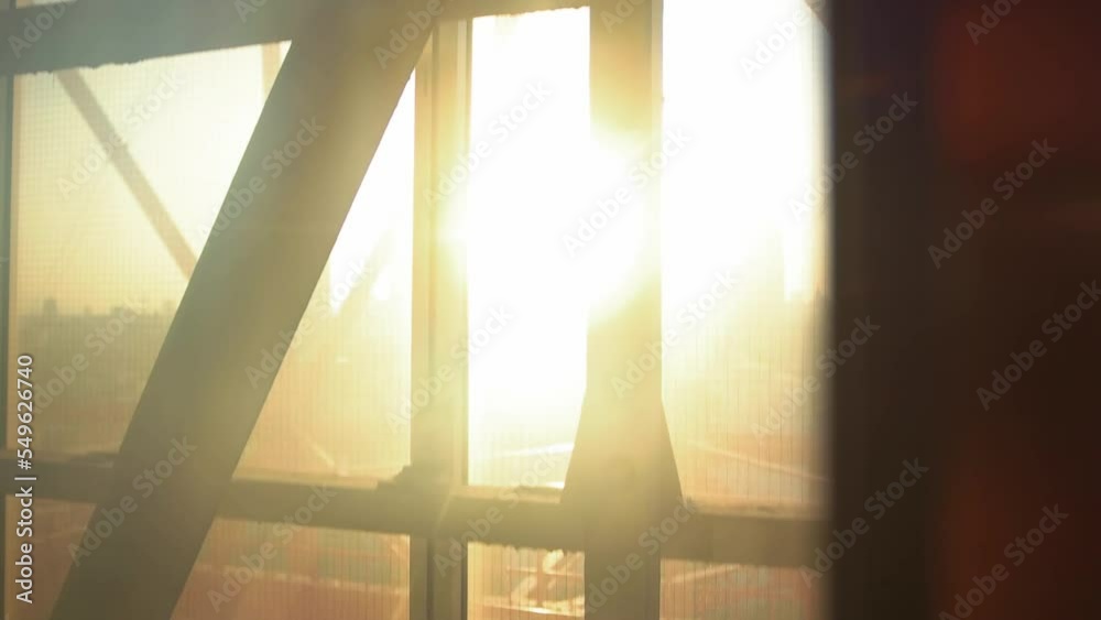 Sunset view from glass elevator going up in Tokyo tower, Japan, slow motion