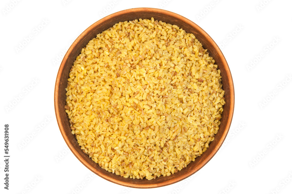 bulgur in a clay bowl on a white background. the concept of a good harvest of bulgur bulgur in a clay bowl on a white background. the concept of a good harvest of bulgur