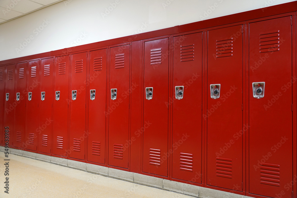 close up on red lockers in the school