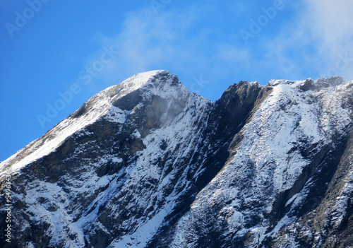 The first autumn snow on the Alpine peak Älplichopf (2641 m) in the Swiss Alps and in the UNESCO World Heritage Tectonic Arena Sardona (UNESCO-Welterbe Tektonikarena Sardona), Vättis - Switzerland © Mario